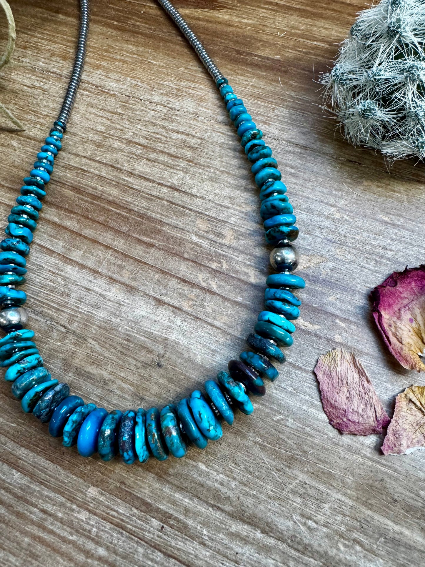 22 inch dark blue graduated turquoise necklace with Sterling silver pearls