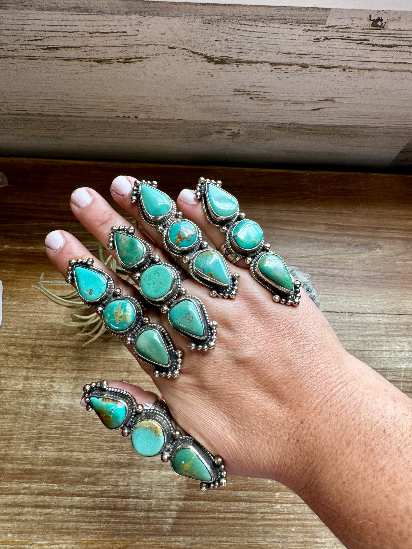 Long adjustable turquoise rings on brass silver